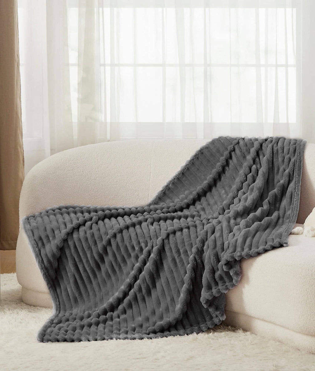Couverture rechauffante en laine polaire Hallo